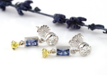 Modern style drop earrings with Yogo Sapphires and Diamonds.