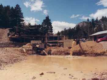 The steam-powered hoist at the English Mine, near left